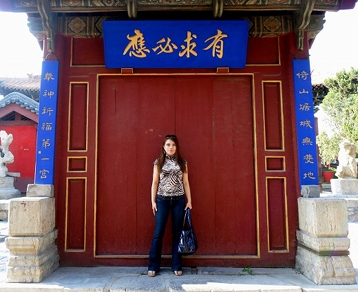 Helen in front of a beautiful Chinese Gate, Mount Tai-shan, China
